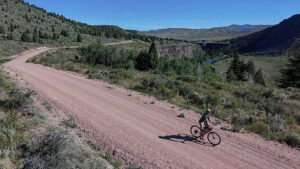 cyclist on backcountry gravel road