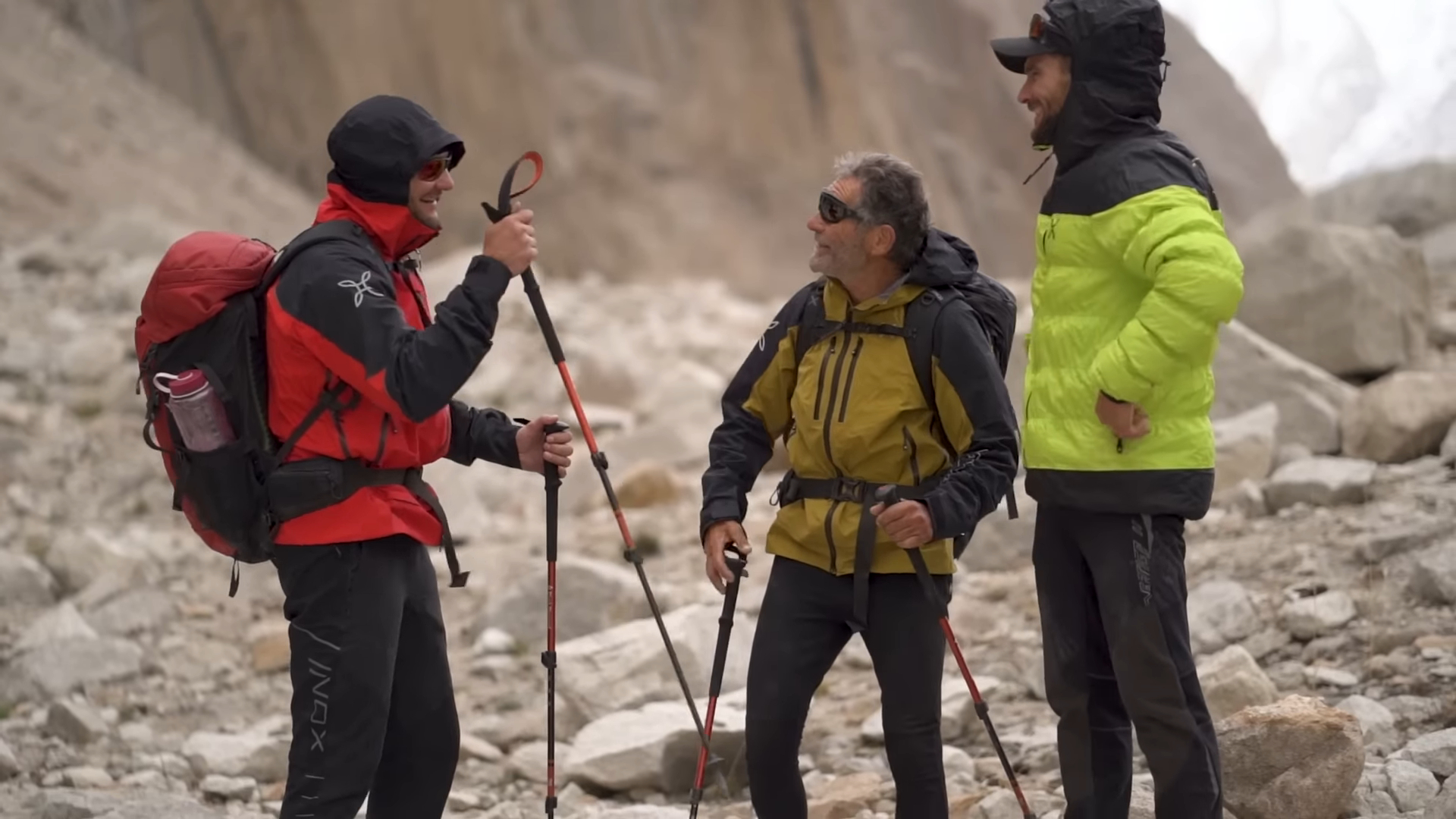 Three men in climbing gear
