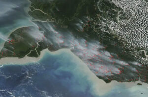 Satellite image of Papua-New Guinea showing fires and smoke