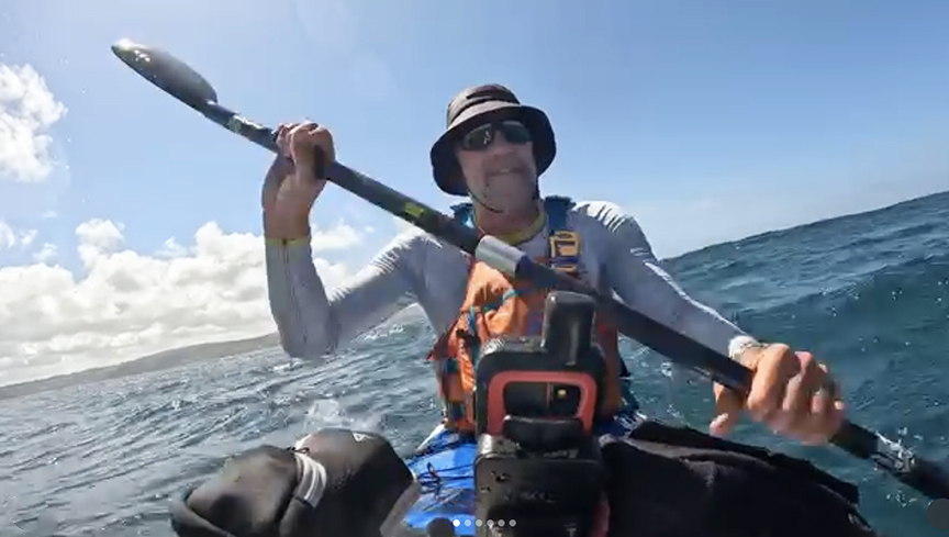 kayaker head on