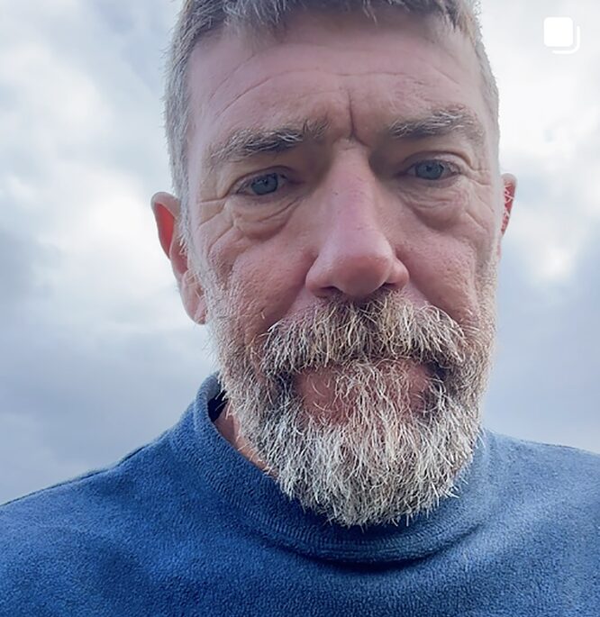portrait of tired bearded man