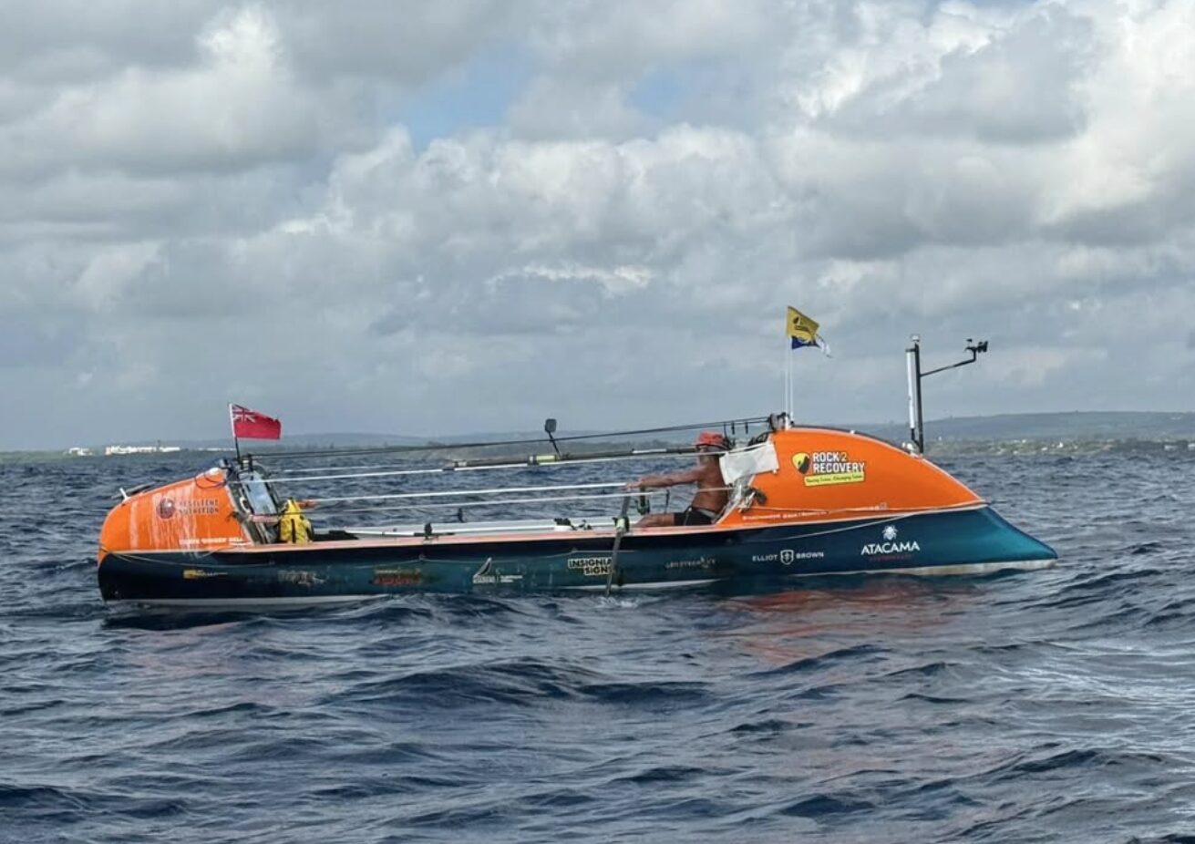 Dave Bell rowing in the last few moments of his 327 days at sea