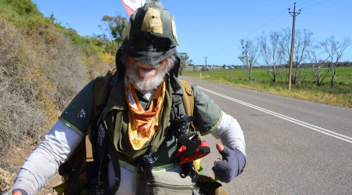 Simon Harvey looks into the camera as Captain Australia.