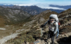 japanese man hiking in mountains