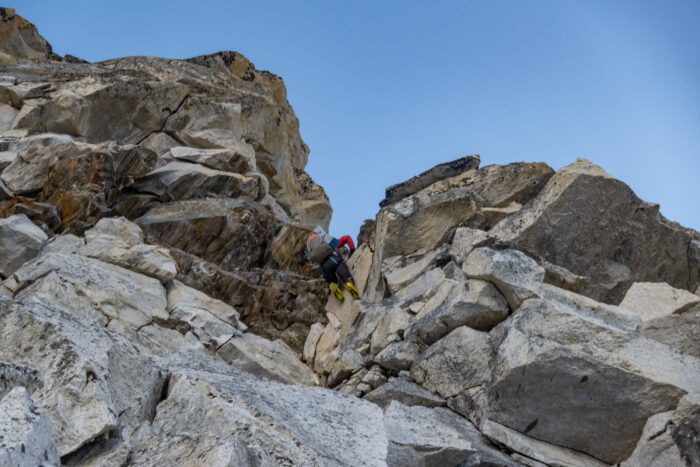 A clibmer on a rocky section of a mixed route. 